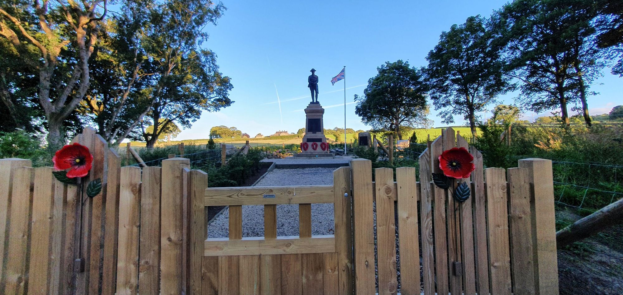 A renewed war memorial and woodlands at Shepley