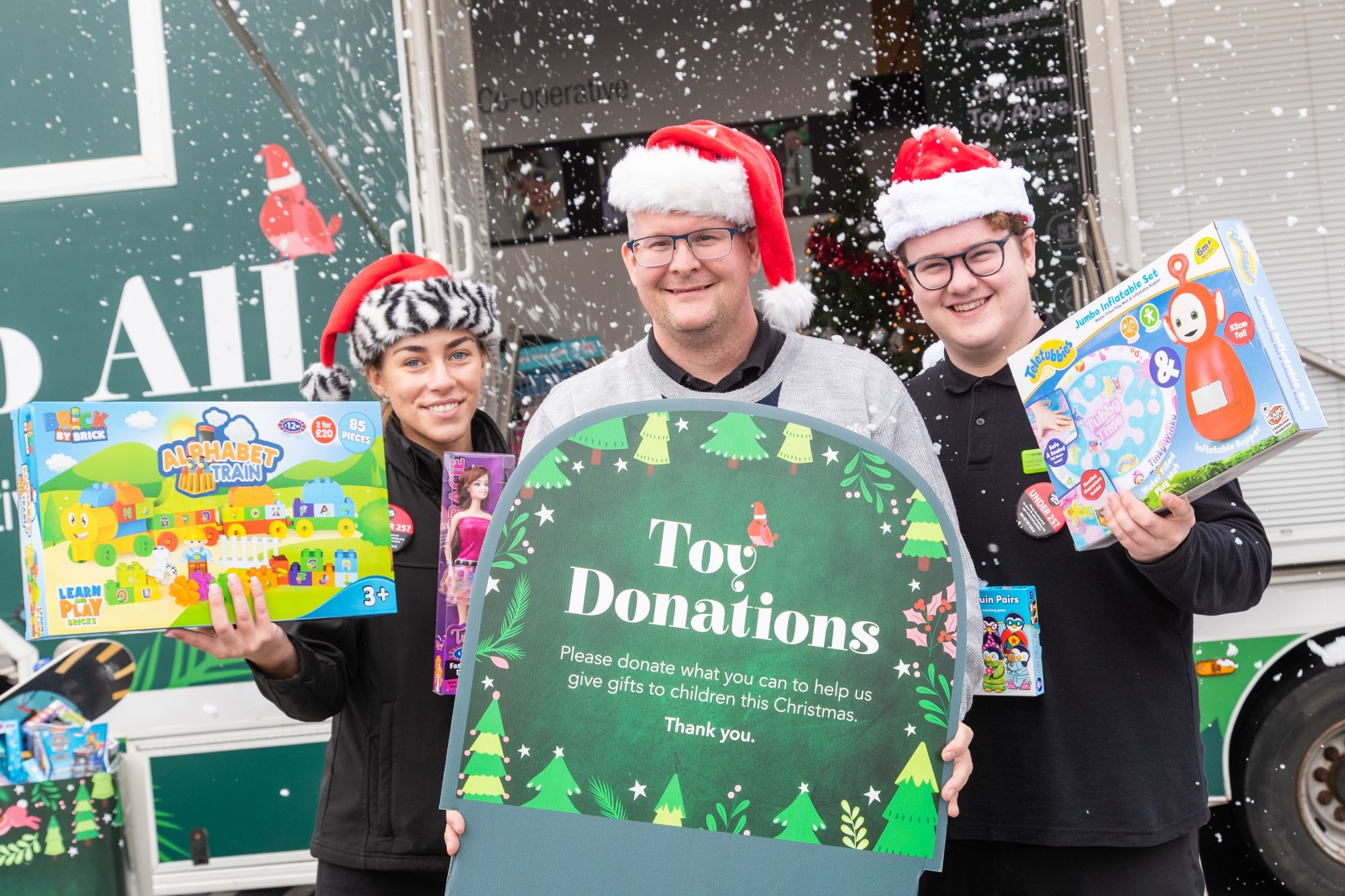 Over 115 gifts donated in support of toy appeal as Co-op Christmas lorry stops off in Lichfield