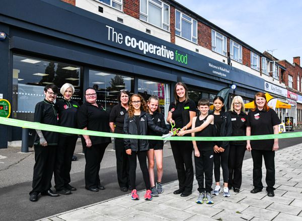 Young athletes cut ribbon on transformed food store close to Commonwealth Games stadium